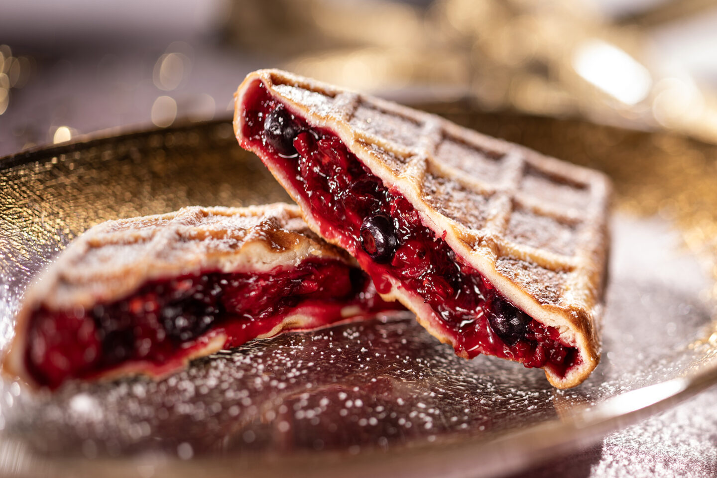 Stuffed waffles with mixed berry compote filling