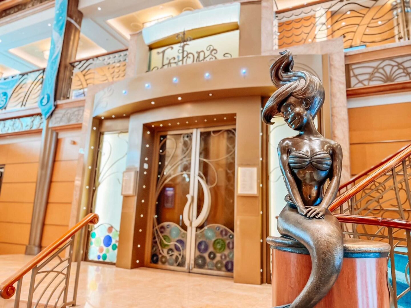 Little Mermaid Statue on disney Wonder Atrium Lobby