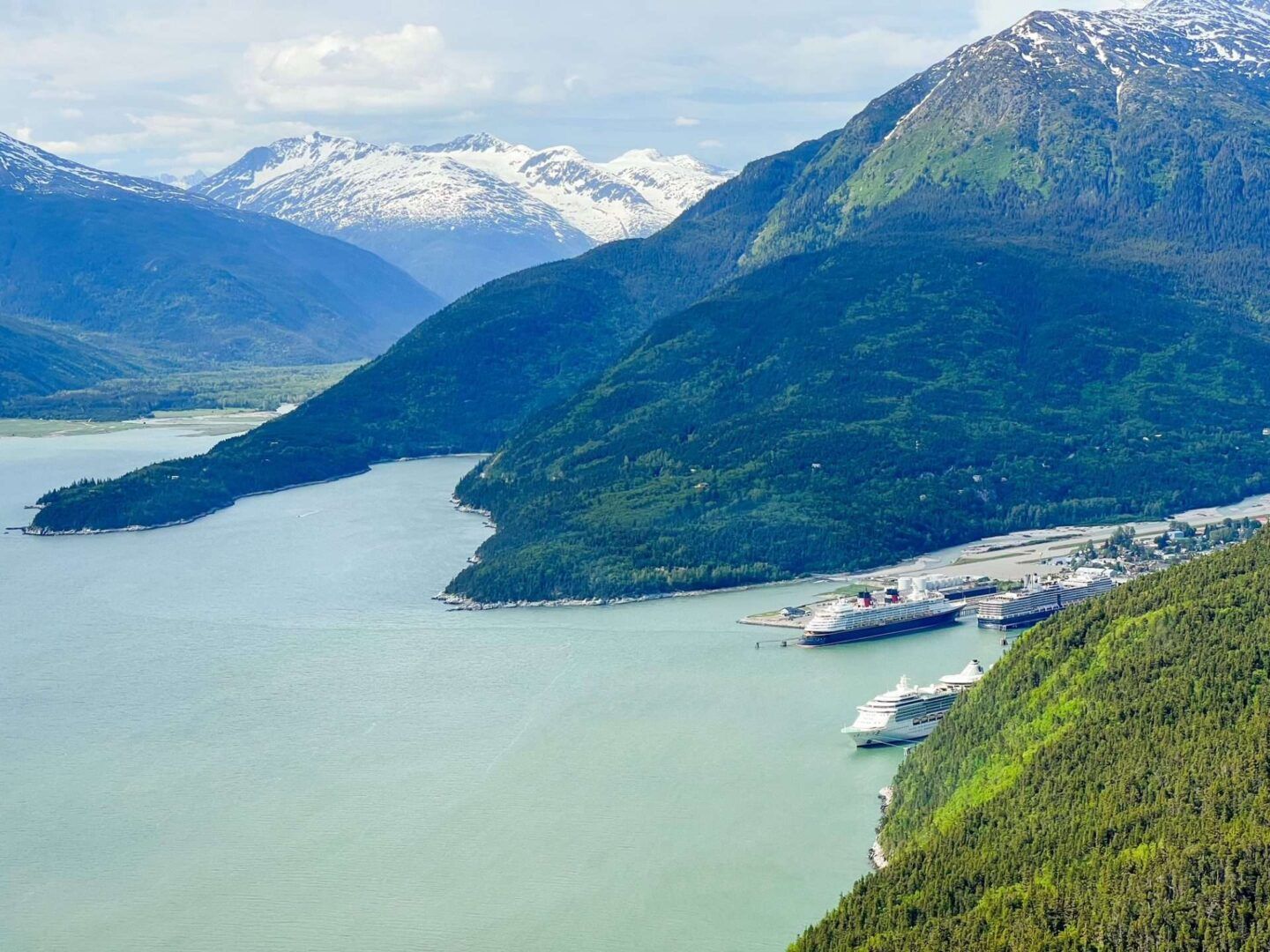 Disney Cruise Ship Docked in Alaska Port Town from Helicopter View