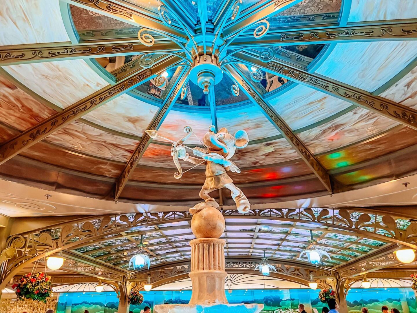 Disney Enchanted Garden Restaurant Mickey Statue