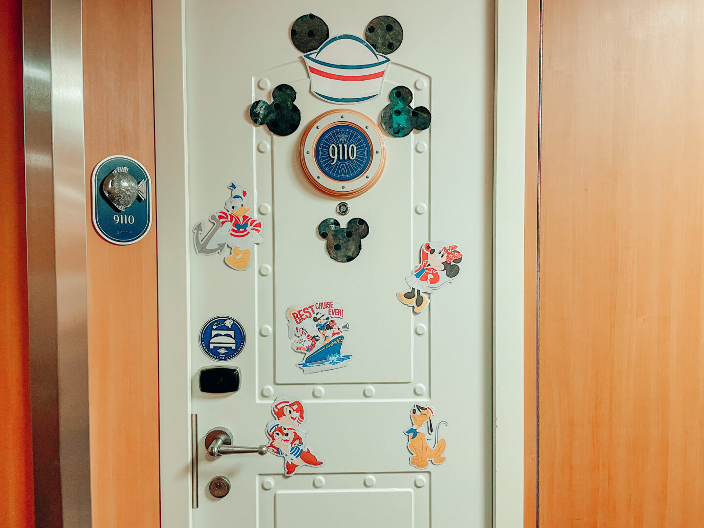 Disney Cruise stateroom 9110 decorated with cruise magnets 