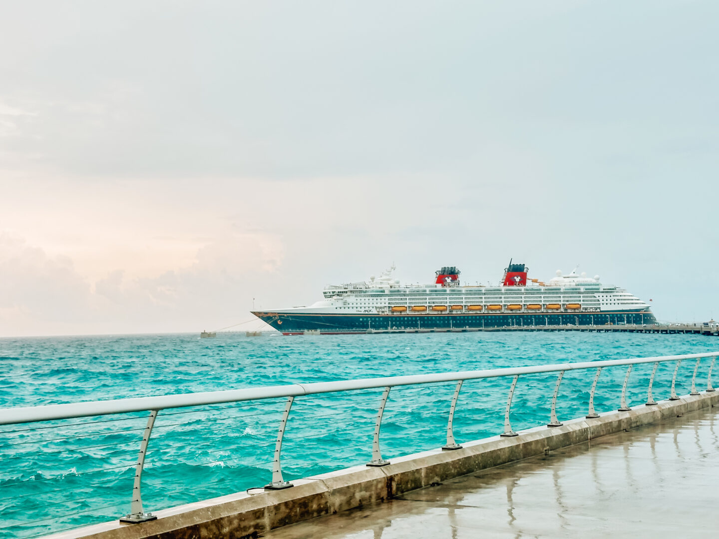 Disney Magic docked at Disney's Lookout Cay. Lighthouse Point pier and the Disney Magic.