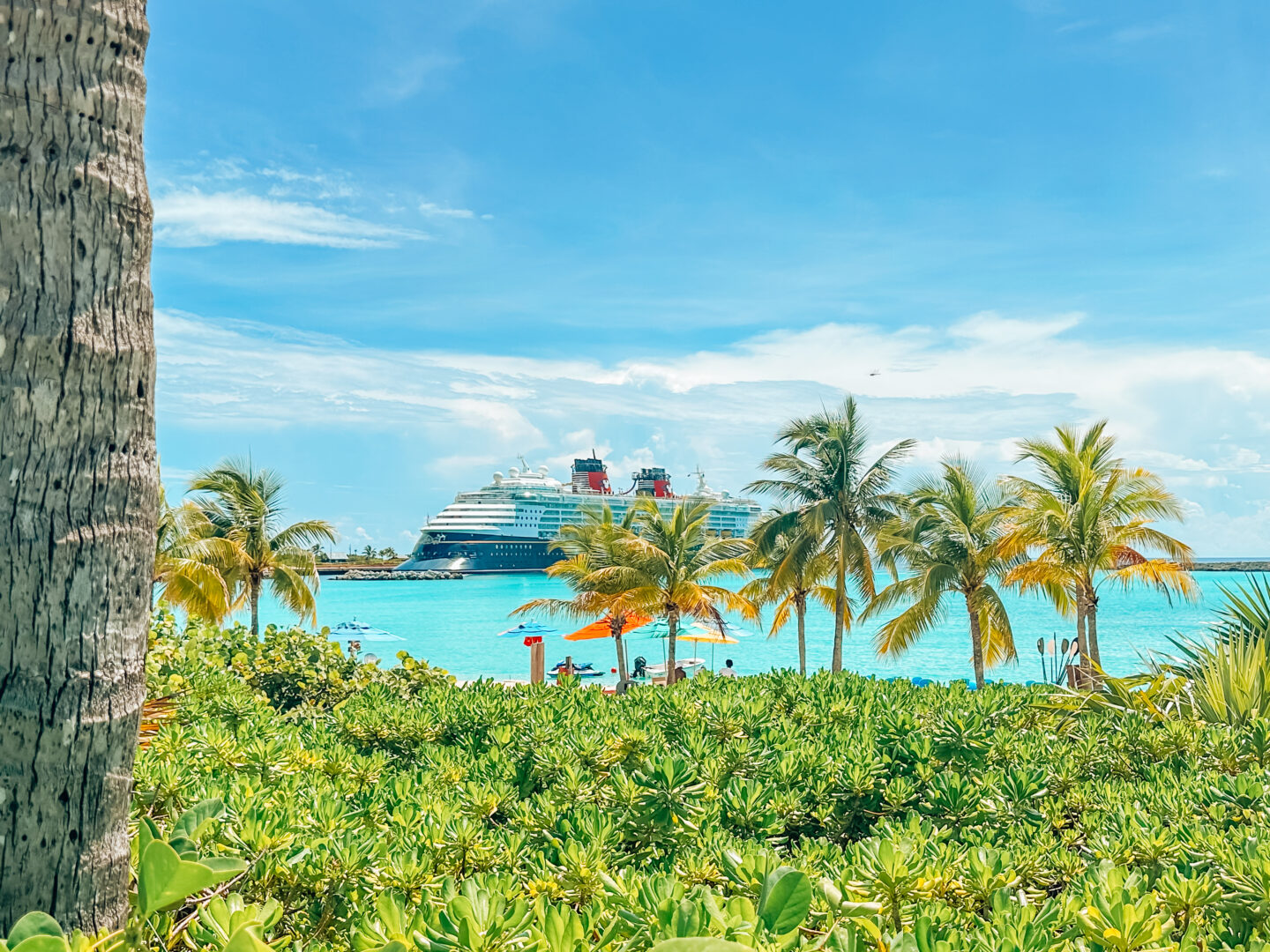 Castaway Cay, Disney's Private Island. Disney Magic docked at Castaway Cay as seen from Family Beach